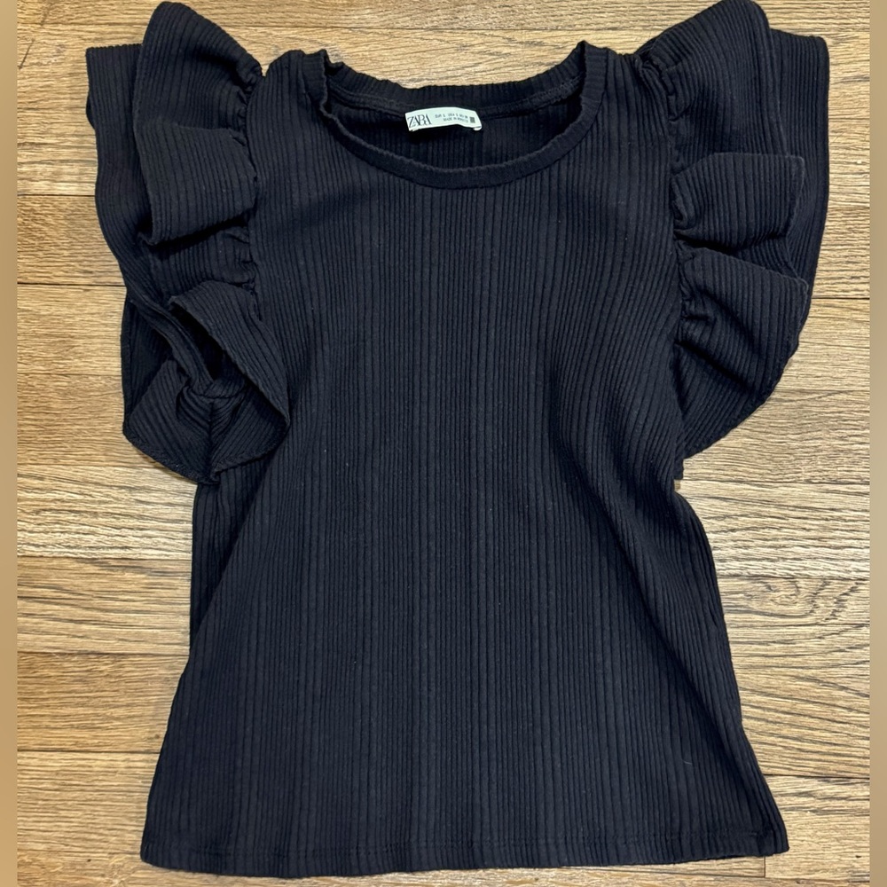 Size runs small! Black and cream